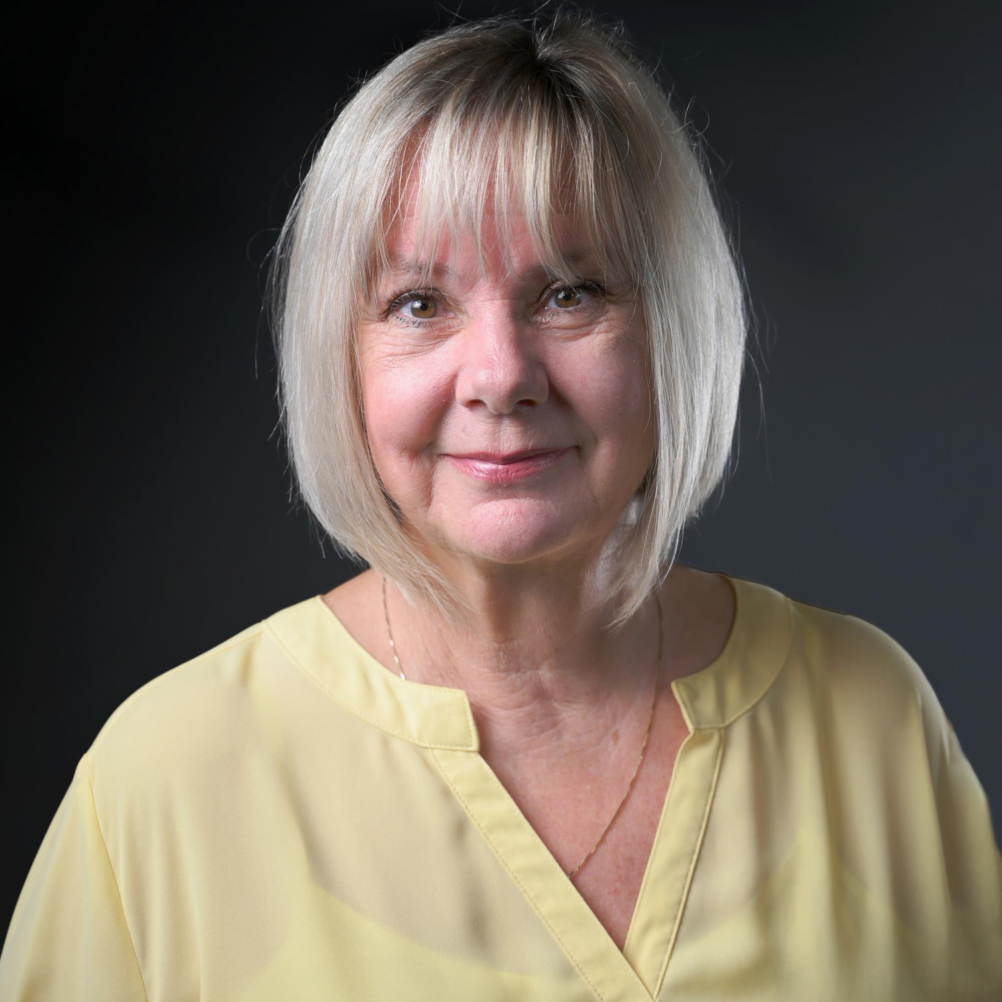 Portrait of Elaine Johns in Yellow Shirt