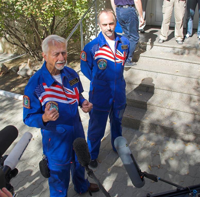 Owen Garriott Speaking to News Reporters with Fellow Astronaut Richard