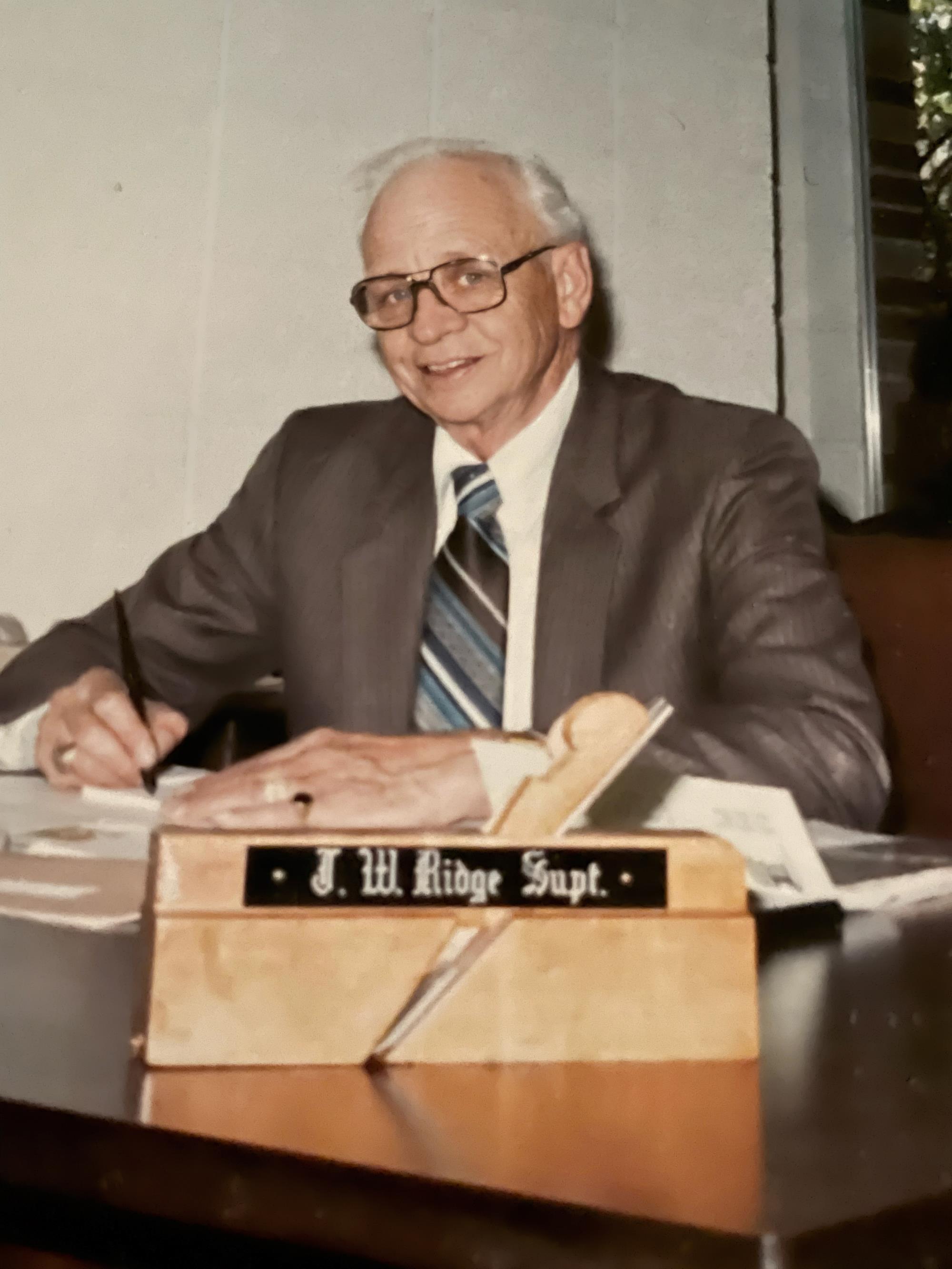 Photo - Jewel William Ridge at his desk