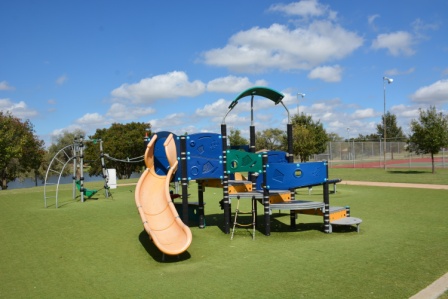 Meadowlake S playground from left back corner